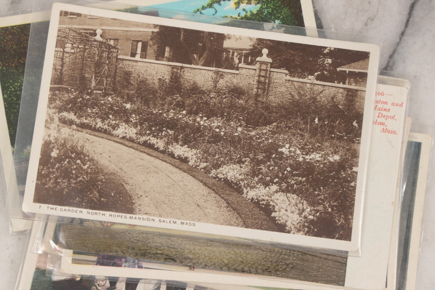 Lot 144 - Grouping Of 40+ Antique And Vintage Salem, Massachusetts Postcards Including 13 Individual Views Featuring House Of The Seven Gables And Old Witch House, And Many Duplicates Showing Salem And Empire Theaters On Essex Street