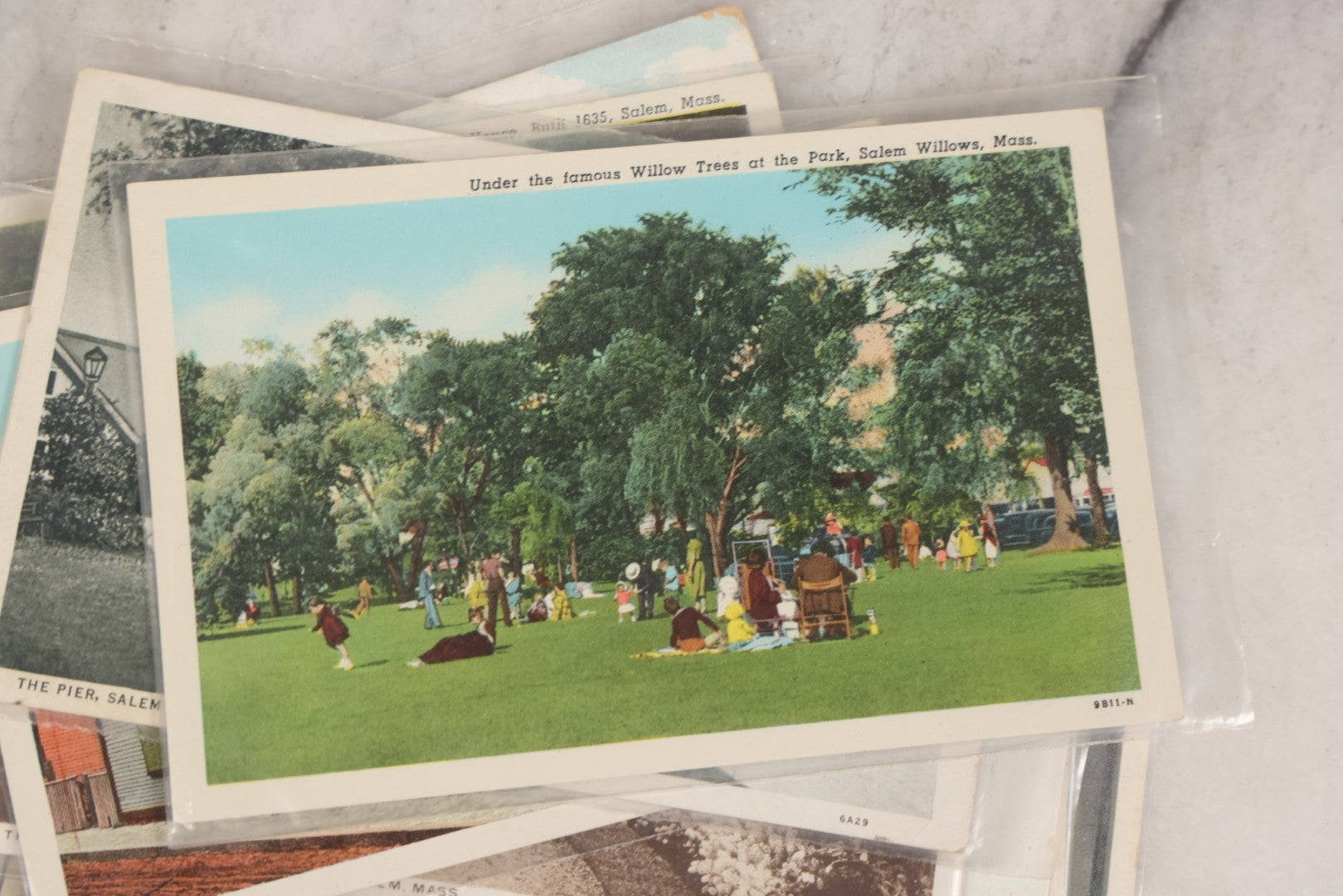 Lot 144 - Grouping Of 40+ Antique And Vintage Salem, Massachusetts Postcards Including 13 Individual Views Featuring House Of The Seven Gables And Old Witch House, And Many Duplicates Showing Salem And Empire Theaters On Essex Street