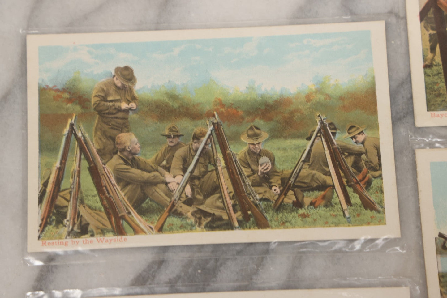 Lot 145 - Grouping Of 12 Antique World War I Soldier Training Postcards With Original Souvenir Folder, Series No. 1, Illustrated Postal Card & Novelty Co., New York