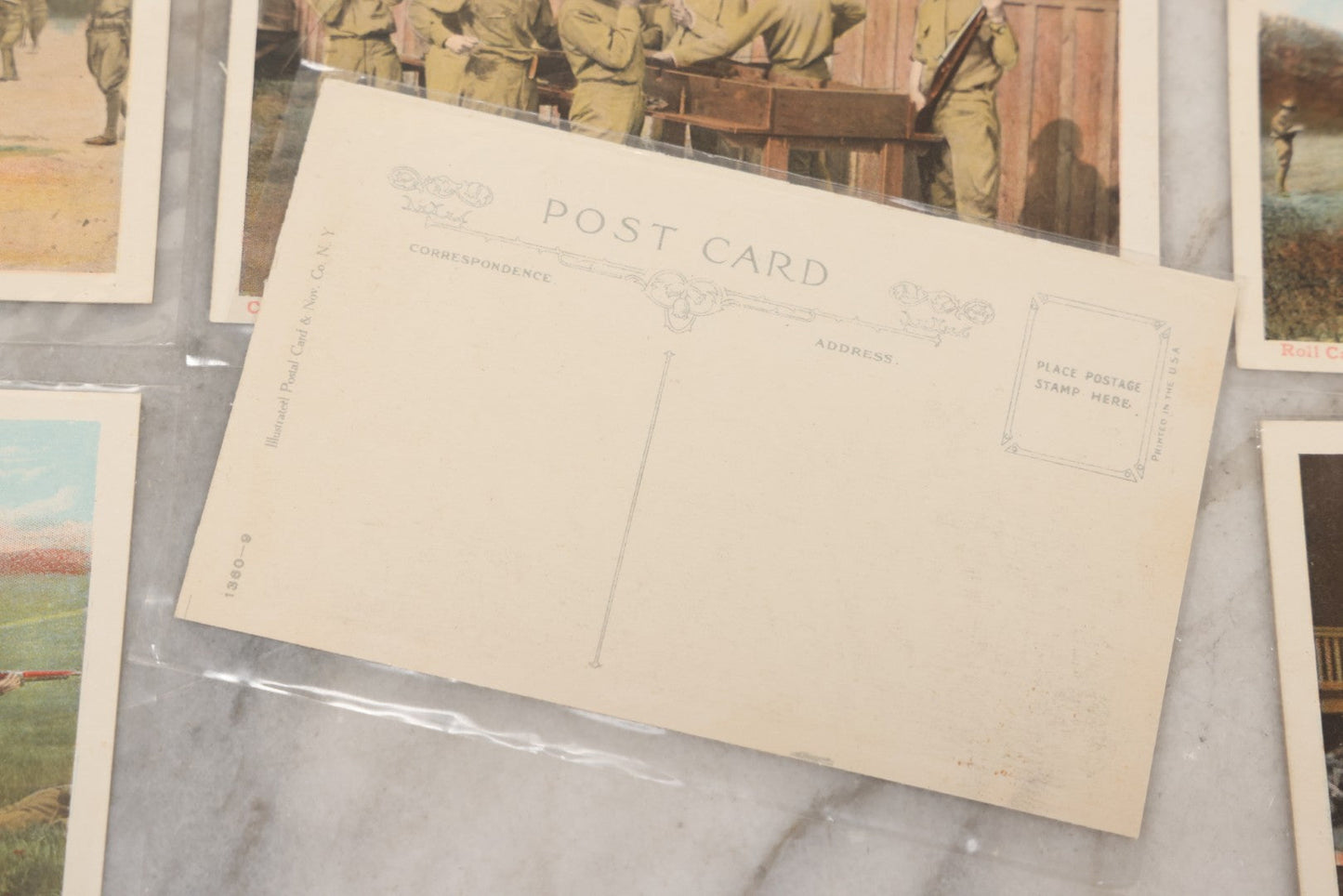 Lot 145 - Grouping Of 12 Antique World War I Soldier Training Postcards With Original Souvenir Folder, Series No. 1, Illustrated Postal Card & Novelty Co., New York