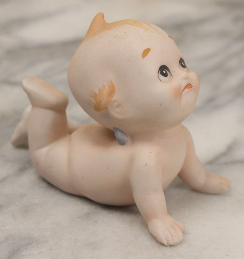 Lot 150 - Pair Of Antique Bisque Kewpie Dolls, One In Wicker Rocking Crib With Lace Bedding