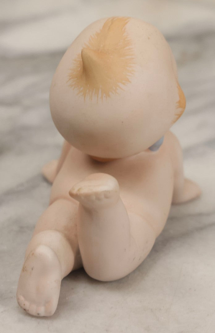 Lot 150 - Pair Of Antique Bisque Kewpie Dolls, One In Wicker Rocking Crib With Lace Bedding