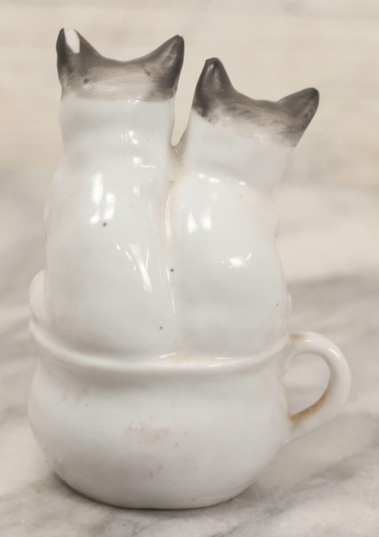 Lot 155 - Antique Porcelain Figure Of Two Cats On Cup, "Dividing The Pot" Gilt Lettering, 3-3/4" H