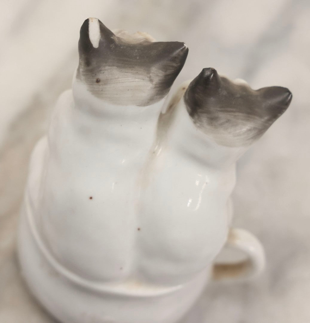 Lot 155 - Antique Porcelain Figure Of Two Cats On Cup, "Dividing The Pot" Gilt Lettering, 3-3/4" H