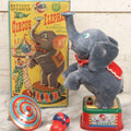 Lot 176 - Vintage Rosko-Steele Battery-Operated Circus Elephant Toy With Blowing Ball And Parasol, In Original Box, Made In Japan, Working Condition