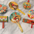 Lot 179 - Grouping Of Seven Vintage And Antique Tin Lithograph Noisemaker Toys Including Dancing Clowns, Woman In Martini Glass, Party Scenes, And Animal Top