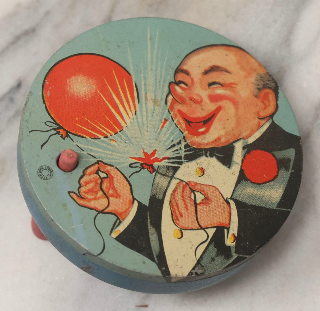 Lot 179 - Grouping Of Seven Vintage And Antique Tin Lithograph Noisemaker Toys Including Dancing Clowns, Woman In Martini Glass, Party Scenes, And Animal Top