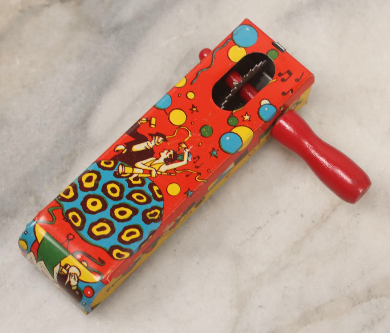 Lot 179 - Grouping Of Seven Vintage And Antique Tin Lithograph Noisemaker Toys Including Dancing Clowns, Woman In Martini Glass, Party Scenes, And Animal Top