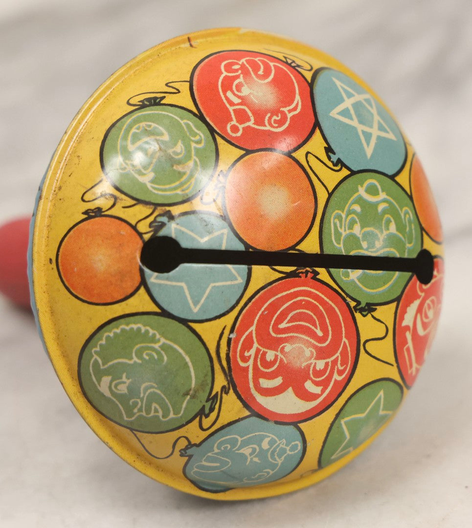 Lot 179 - Grouping Of Seven Vintage And Antique Tin Lithograph Noisemaker Toys Including Dancing Clowns, Woman In Martini Glass, Party Scenes, And Animal Top
