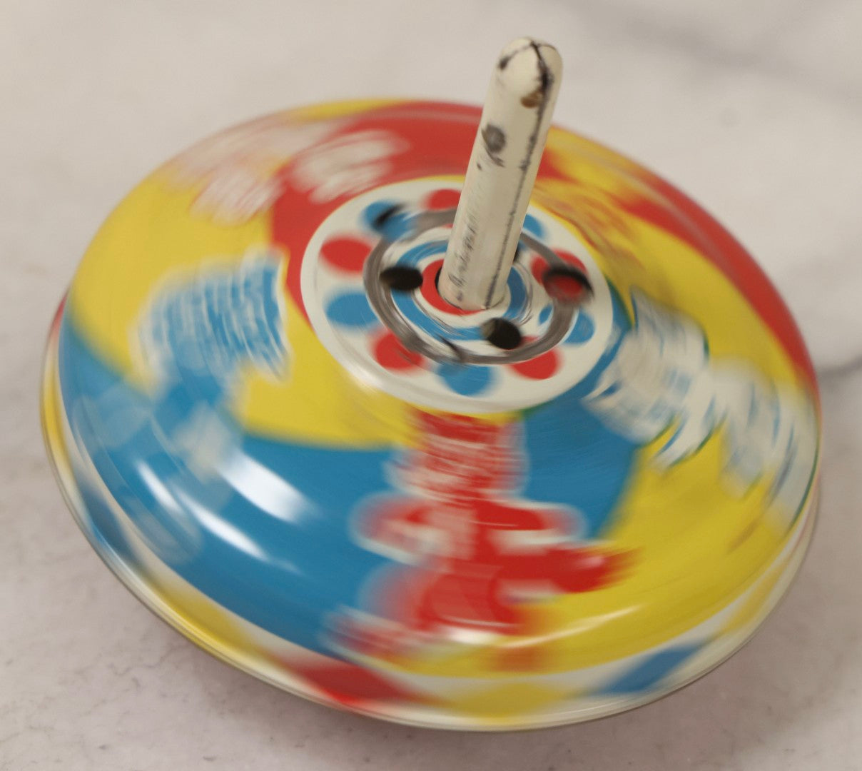 Lot 179 - Grouping Of Seven Vintage And Antique Tin Lithograph Noisemaker Toys Including Dancing Clowns, Woman In Martini Glass, Party Scenes, And Animal Top