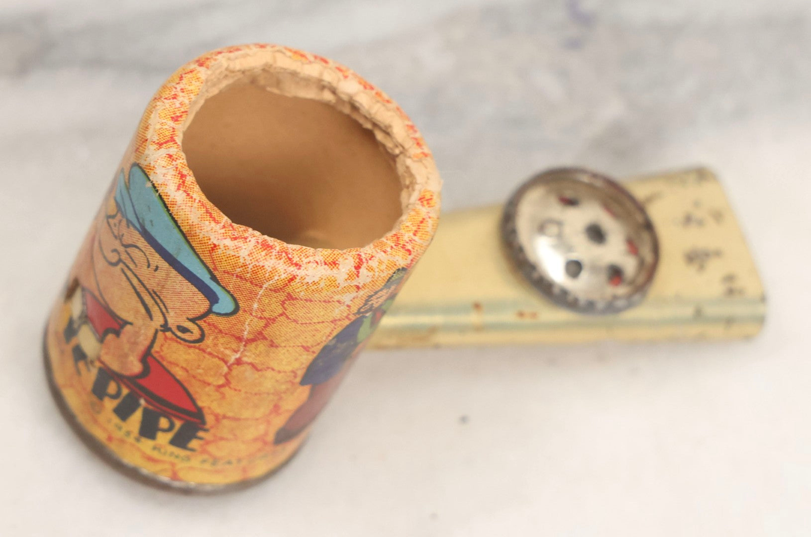 Lot 183 - Antique Tin And Paper Toy Popeye Pipe By Northwestern Products, St. Louis, Missouri, 1934
