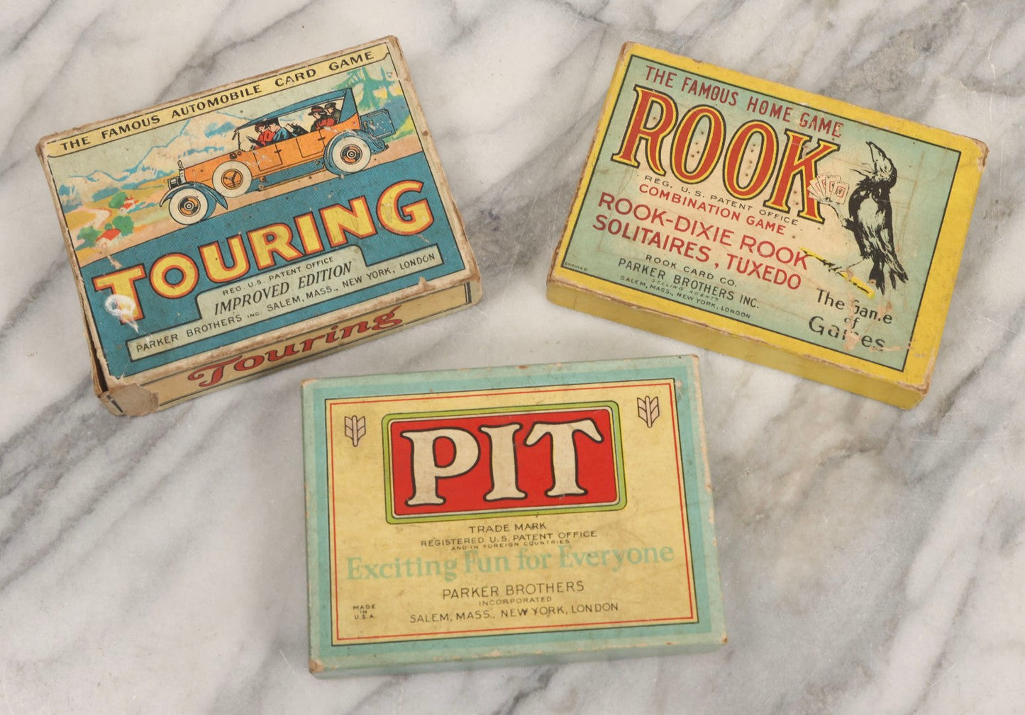 Lot 184 - Grouping Of Three Antique And Vintage Parker Brothers Card Games — Touring (1926), Rook Combination Game (1924), And Pit (1919)