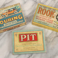 Lot 184 - Grouping Of Three Antique And Vintage Parker Brothers Card Games — Touring (1926), Rook Combination Game (1924), And Pit (1919)