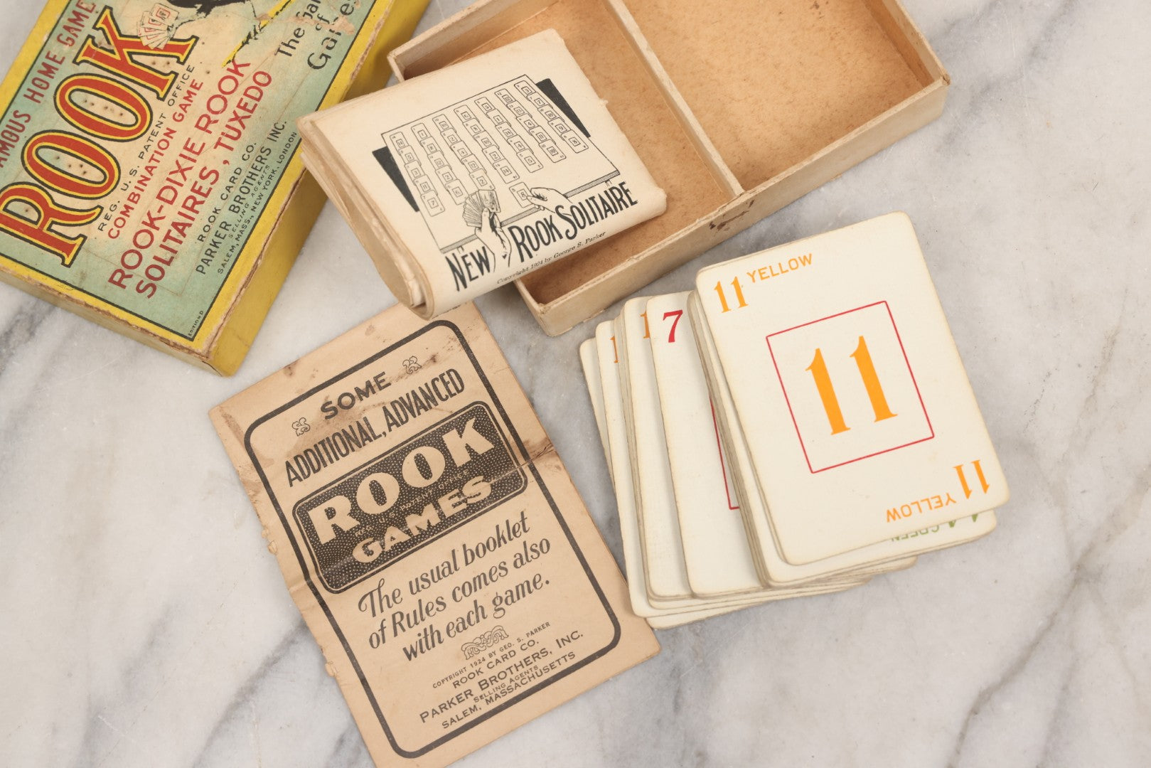 Lot 184 - Grouping Of Three Antique And Vintage Parker Brothers Card Games — Touring (1926), Rook Combination Game (1924), And Pit (1919)