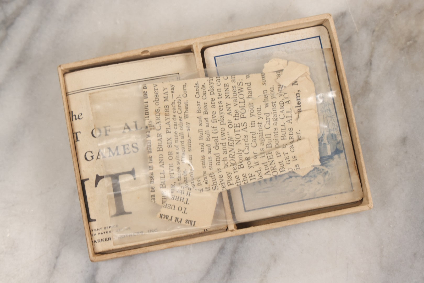 Lot 184 - Grouping Of Three Antique And Vintage Parker Brothers Card Games — Touring (1926), Rook Combination Game (1924), And Pit (1919)
