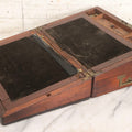 Lot 007 - Antique Folding Wooden Writing Lap Desk With Velvet Interior, Brass Hardware, And Dual Inkwells, Circa Late 19th Century
