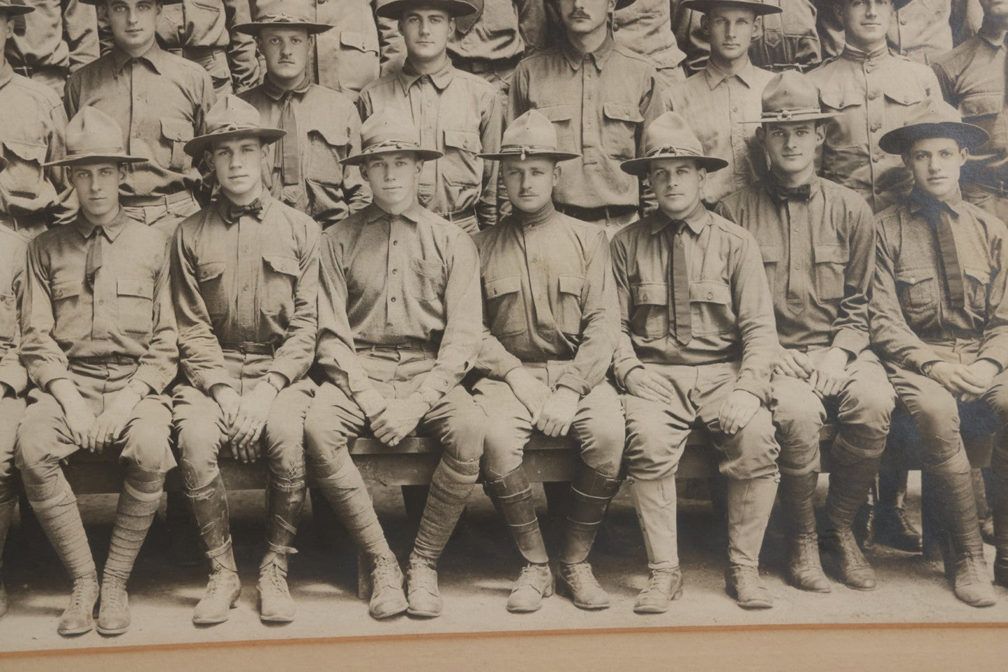 Lot 016 - Antique Boareded Photograph Of U.S. Army Soldiers In Early World War I Service Uniforms With Campaign Hats, Circa 1917–1918, In Frame, 17-5/8" x 13-5/8"