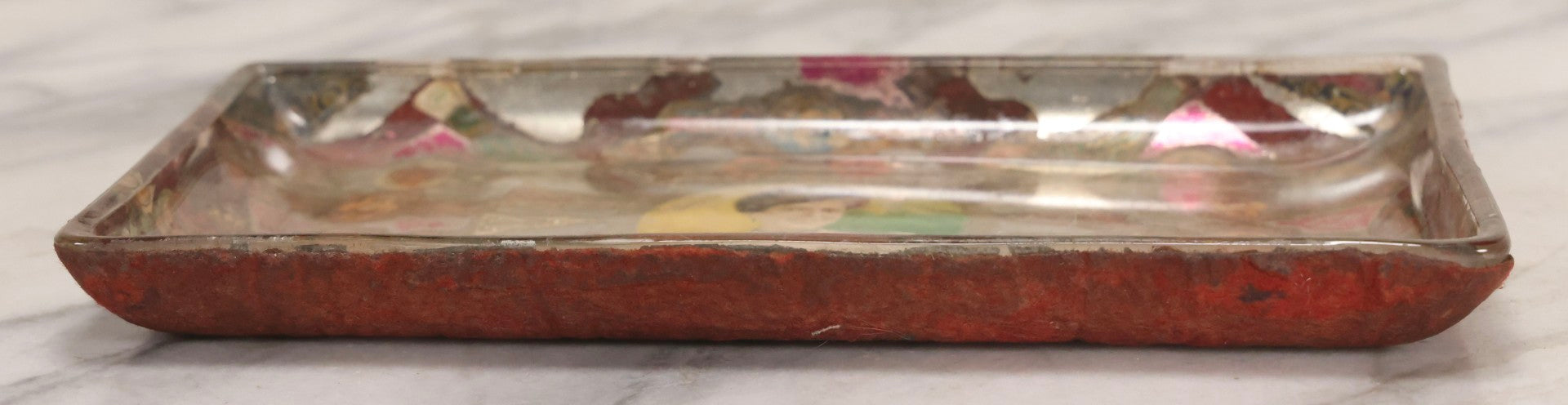 Lot 031 - Antique Reverse Painted And Collaged Cigar Bands Glass Tray With Portrait Of Woman And Red Felt Backing, 8-7/8" x 5"