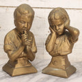 Lot 033 - Pair Of Vintage Gold-Painted Chalkware Busts Of Boy Playing Recorder And Girl Covering Her Ears, After E. Villanis For Esco Products, 9-1/2" H
