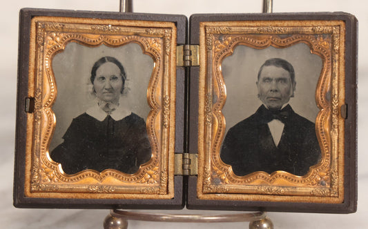 Lot 050 - Pair Of Antique 1/9th Plate Ruby Ambrotype Photographs Of Elderly Married Couple In Littlefield, Parsons & Co. Double Thermoplastic Union Case, Patented 1856–1857, With Herald Design