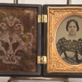 Lot 052 - Antique 1/9th Plate Ambrotype Photograph Of Young Woman In Flower-Patterned Dress In Thermoplastic Union Case Patented By S. Peck 1854 And H. Halverson 1855