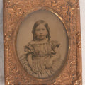 Lot 054 - Antique 1/9th Plate Ruby Ambrotype Photograph Of Pretty Young Girl With Blonde Curls In Checkered Off-Shoulder Dress, Uncased With Brass Mat And Preserver