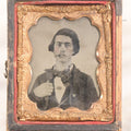 Lot 060 - Antique 1/9th Plate Tintype Photograph Of Young Man With Long Dark Hair And Giant Bowtie Smoking A Cigar, In Half Leatherette Union Case