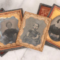 Lot 062 - Trio Of Antique 1/9th Plate Ruby Ambrotype Photographs Including Little Girl In Dress, Elderly Woman With Tied-Back Curls, And Stoic Little Boy, In Mixed Cases