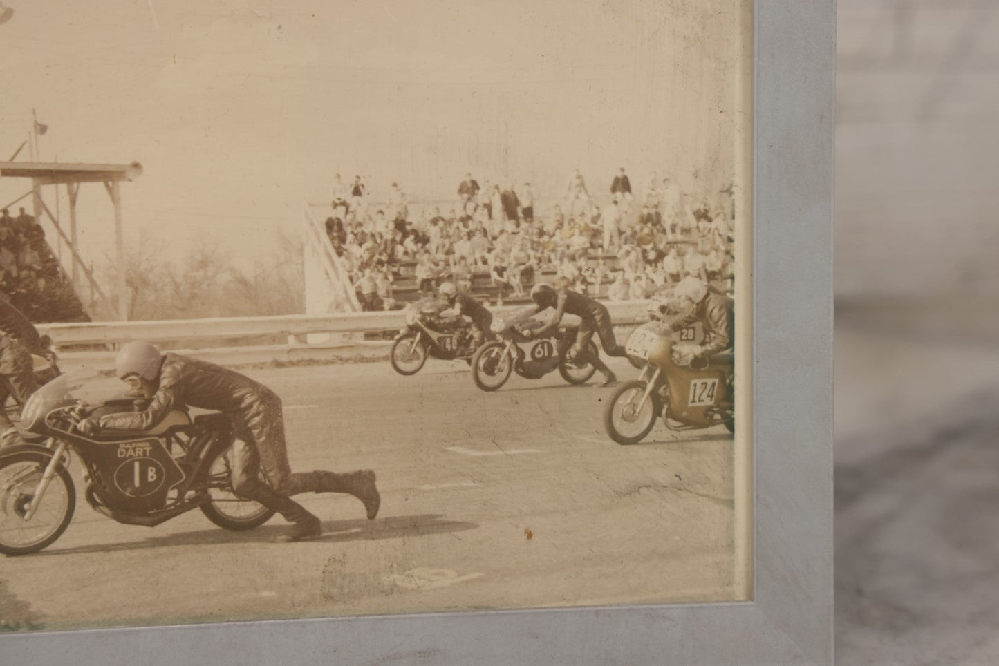 Lot 101 - Vintage Photograph Of Early Motorcycle Race Start, Racers Running Alongside Bikes, In Plastic Frame, 7-1/2" x 5-1/2"