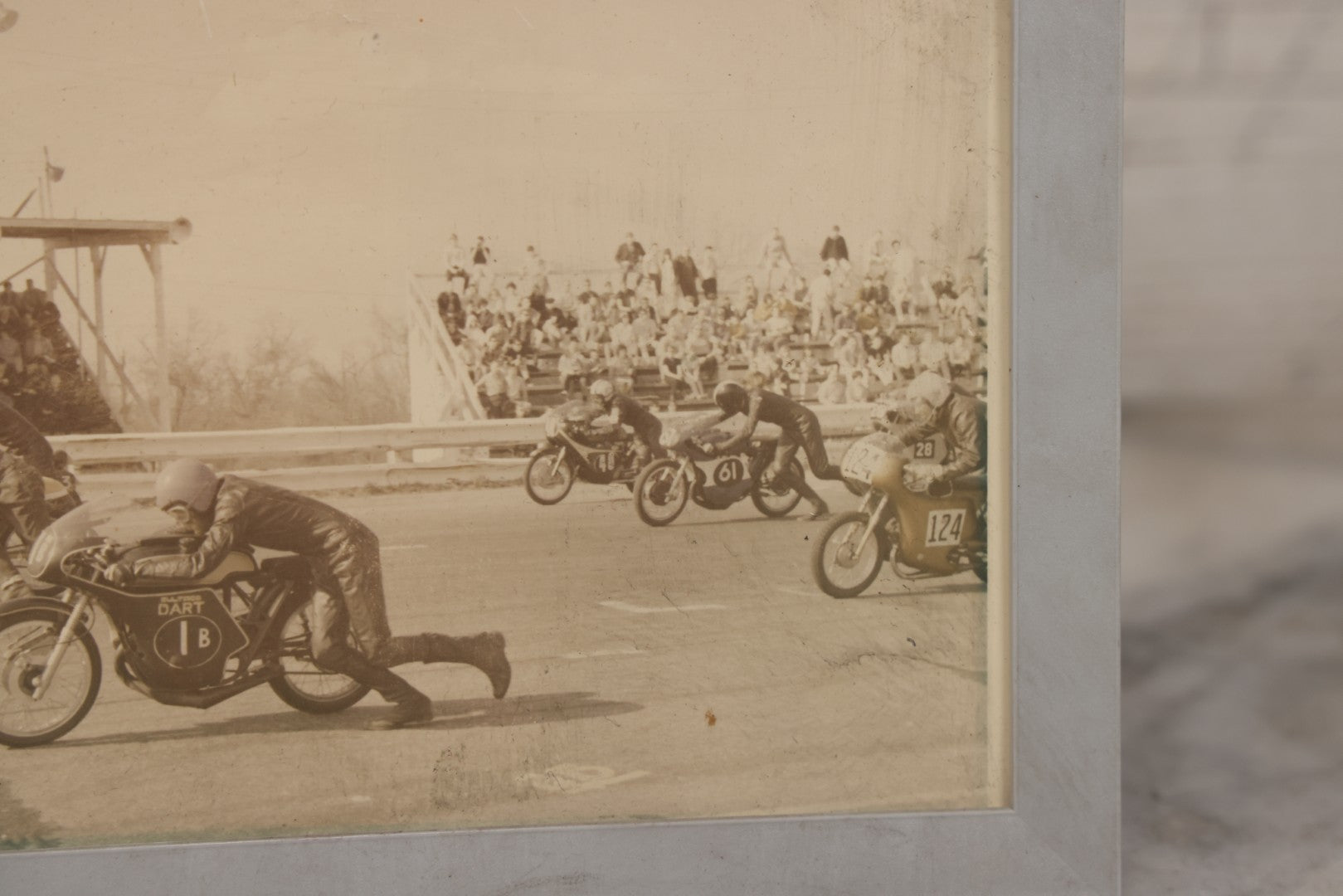 Lot 101 - Vintage Photograph Of Early Motorcycle Race Start, Racers Running Alongside Bikes, In Plastic Frame, 7-1/2" x 5-1/2"