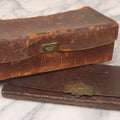 Lot 104 - Pair Of Antique Leather Pouches Including Accordion Handbag With Brass Clasp Depicting Birds And Flowering Branches And Standing Leather Box With Brass Clasp