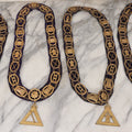 Lot 109 - Grouping Of Four Antique Odd Fellows I.O.O.F.. Purple Chain Collars By Harding Uniform & Regalia Co., Boston, And Fuller Regalia & Costume, Worcester, Massachusetts, With Symbolic Medallions