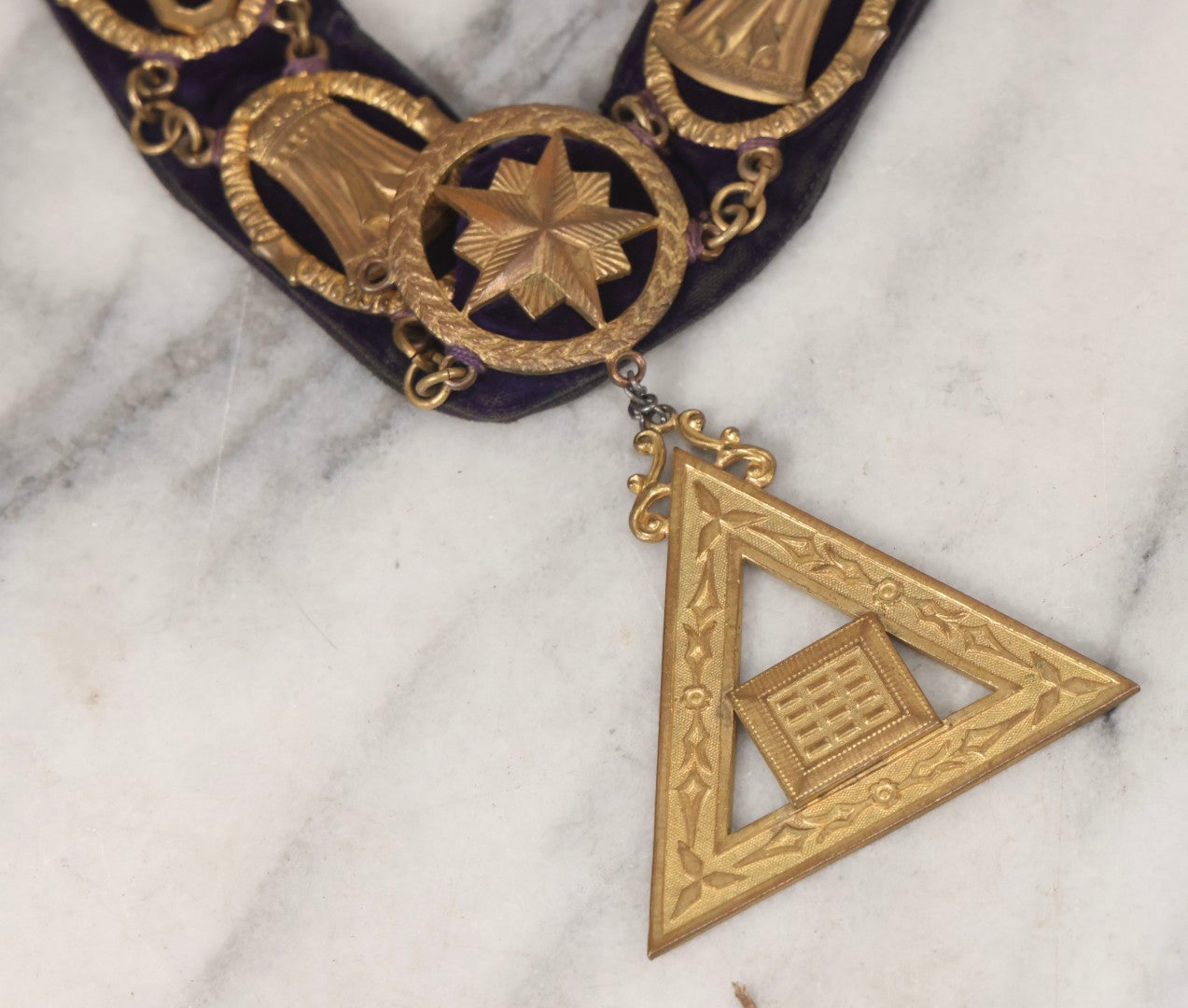 Lot 109 - Grouping Of Four Antique Odd Fellows I.O.O.F.. Purple Chain Collars By Harding Uniform & Regalia Co., Boston, And Fuller Regalia & Costume, Worcester, Massachusetts, With Symbolic Medallions