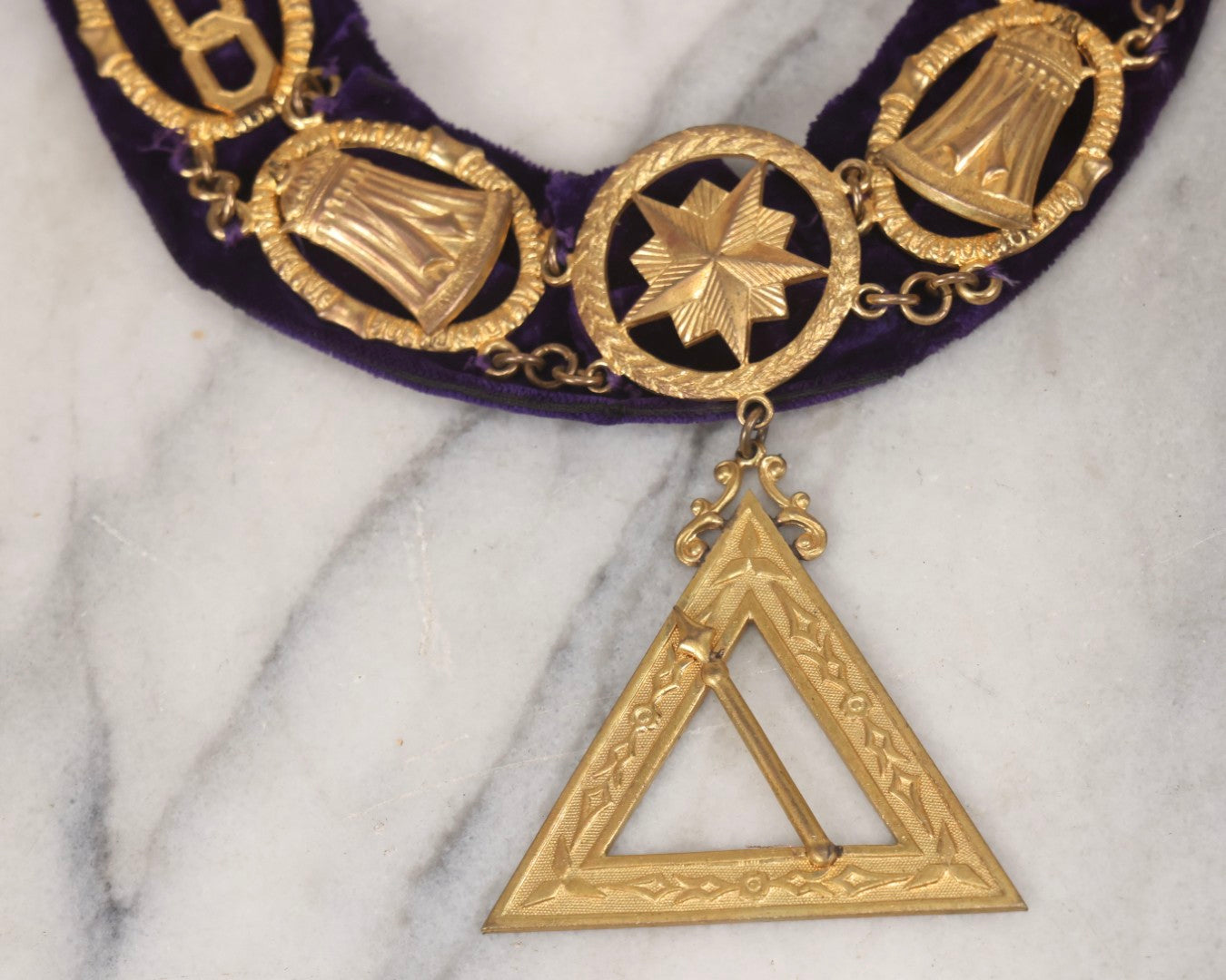 Lot 109 - Grouping Of Four Antique Odd Fellows I.O.O.F.. Purple Chain Collars By Harding Uniform & Regalia Co., Boston, And Fuller Regalia & Costume, Worcester, Massachusetts, With Symbolic Medallions