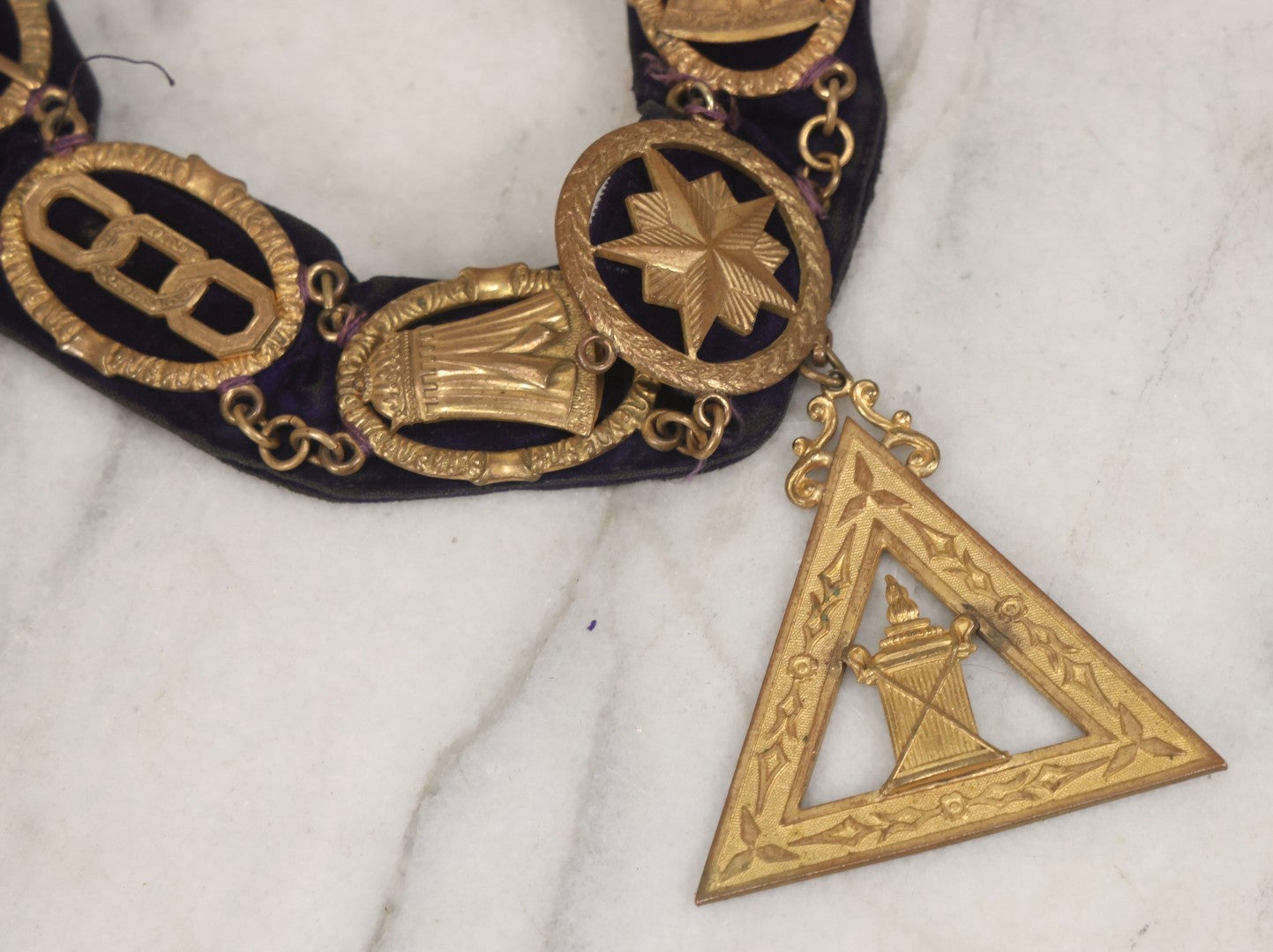Lot 109 - Grouping Of Four Antique Odd Fellows I.O.O.F.. Purple Chain Collars By Harding Uniform & Regalia Co., Boston, And Fuller Regalia & Costume, Worcester, Massachusetts, With Symbolic Medallions