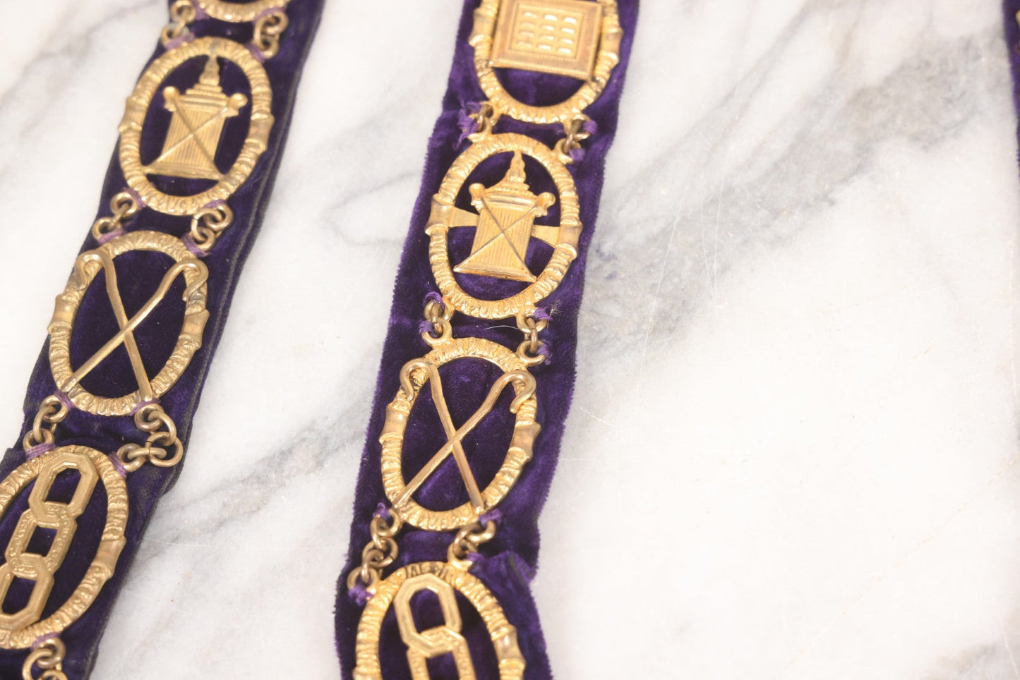 Lot 109 - Grouping Of Four Antique Odd Fellows I.O.O.F.. Purple Chain Collars By Harding Uniform & Regalia Co., Boston, And Fuller Regalia & Costume, Worcester, Massachusetts, With Symbolic Medallions