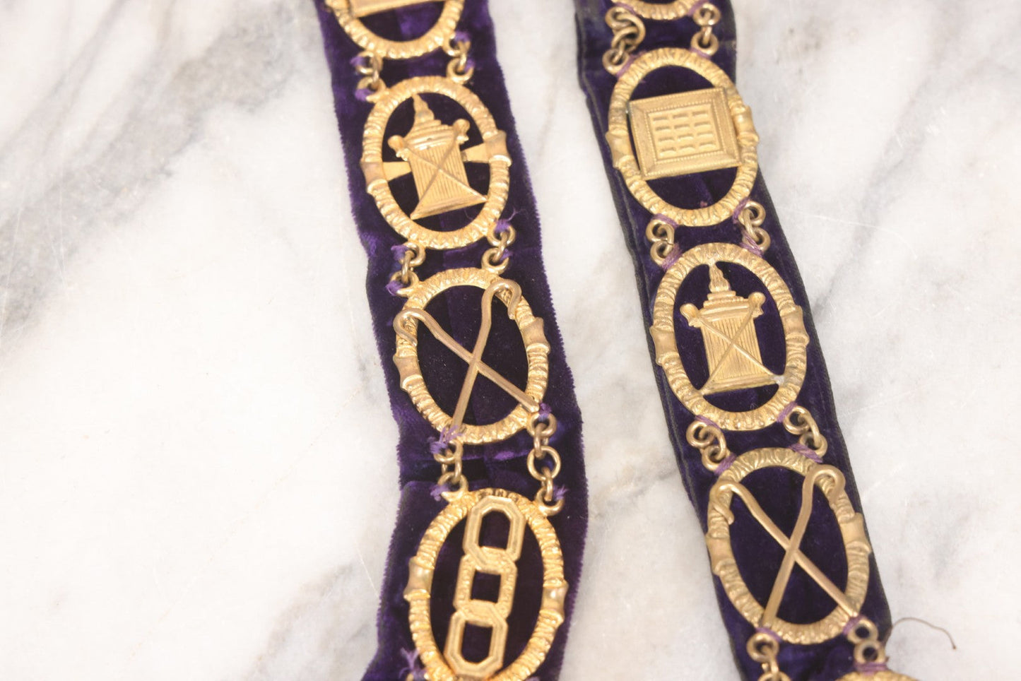 Lot 109 - Grouping Of Four Antique Odd Fellows I.O.O.F.. Purple Chain Collars By Harding Uniform & Regalia Co., Boston, And Fuller Regalia & Costume, Worcester, Massachusetts, With Symbolic Medallions