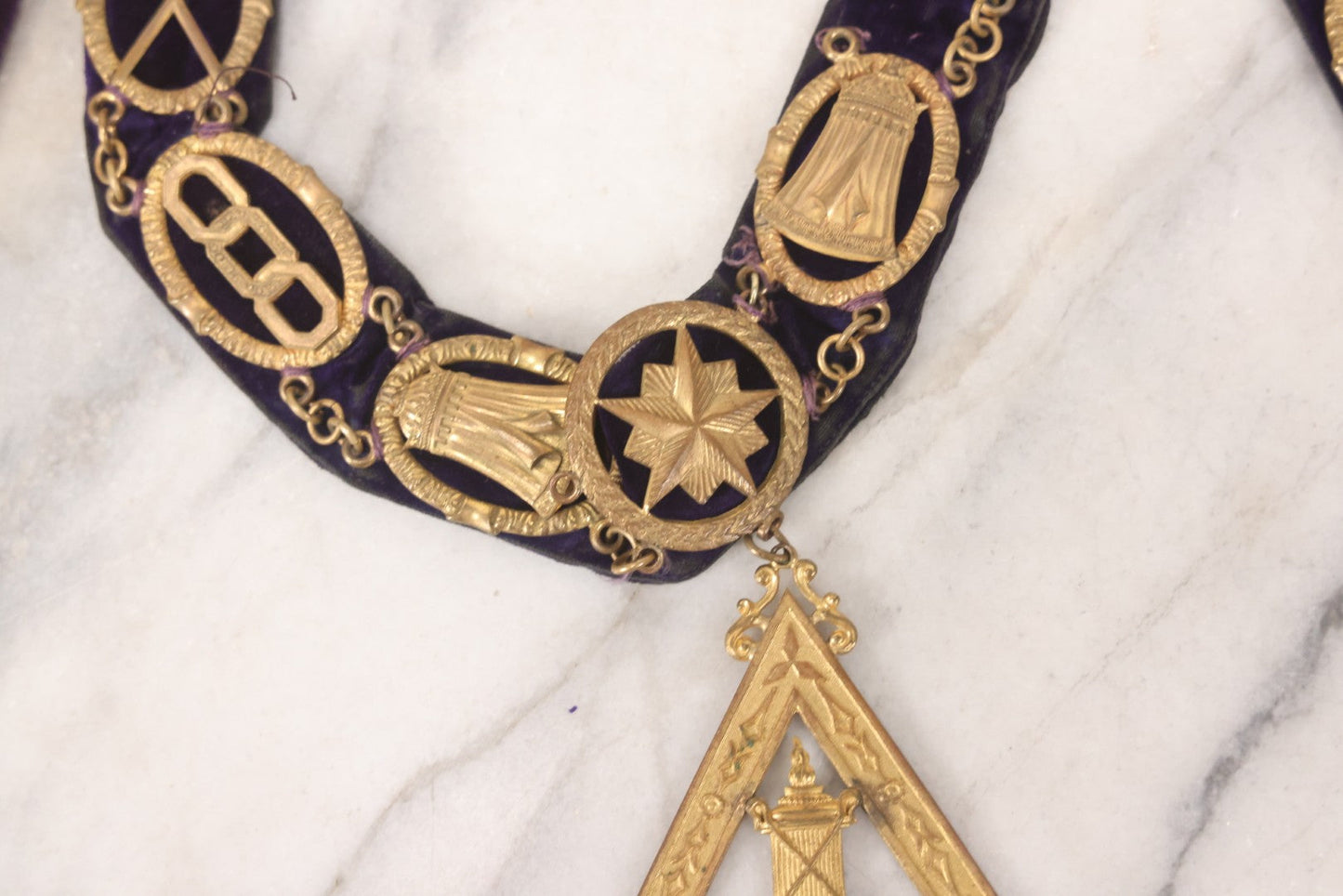Lot 109 - Grouping Of Four Antique Odd Fellows I.O.O.F.. Purple Chain Collars By Harding Uniform & Regalia Co., Boston, And Fuller Regalia & Costume, Worcester, Massachusetts, With Symbolic Medallions
