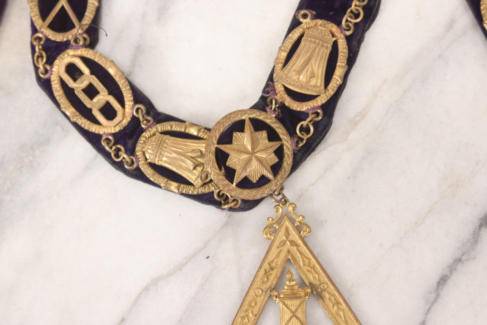 Lot 109 - Grouping Of Four Antique Odd Fellows I.O.O.F.. Purple Chain Collars By Harding Uniform & Regalia Co., Boston, And Fuller Regalia & Costume, Worcester, Massachusetts, With Symbolic Medallions