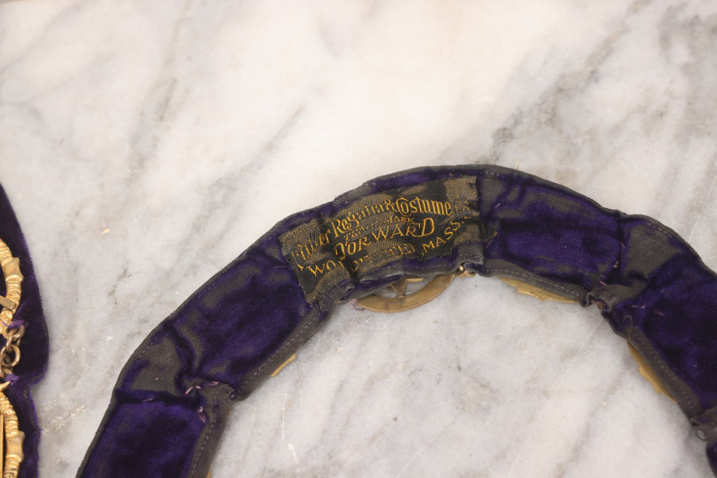 Lot 109 - Grouping Of Four Antique Odd Fellows I.O.O.F.. Purple Chain Collars By Harding Uniform & Regalia Co., Boston, And Fuller Regalia & Costume, Worcester, Massachusetts, With Symbolic Medallions