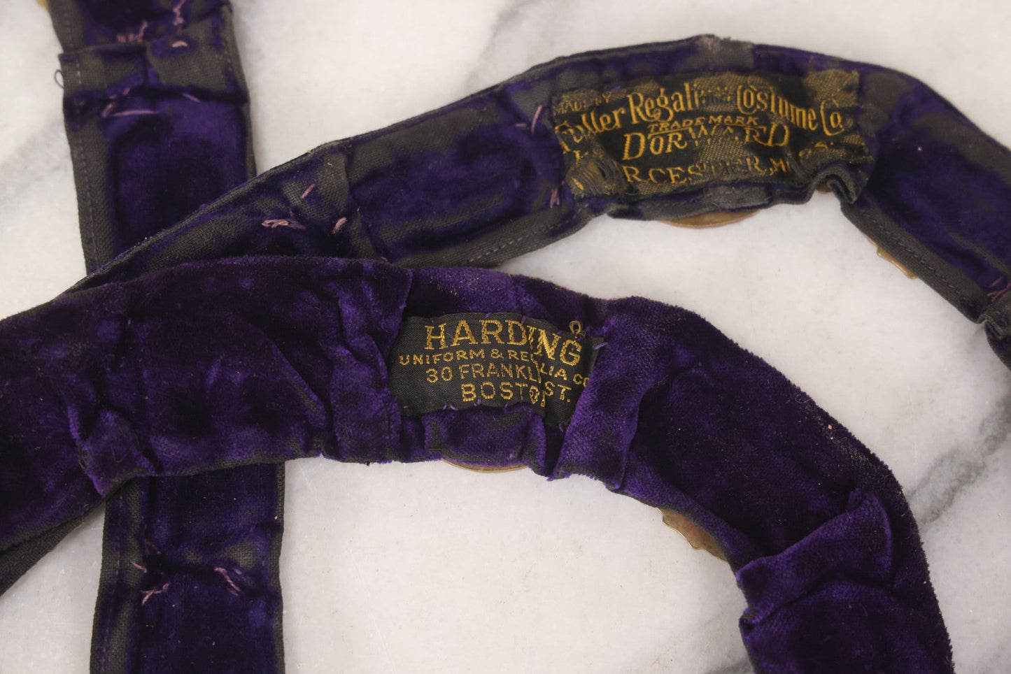 Lot 109 - Grouping Of Four Antique Odd Fellows I.O.O.F.. Purple Chain Collars By Harding Uniform & Regalia Co., Boston, And Fuller Regalia & Costume, Worcester, Massachusetts, With Symbolic Medallions