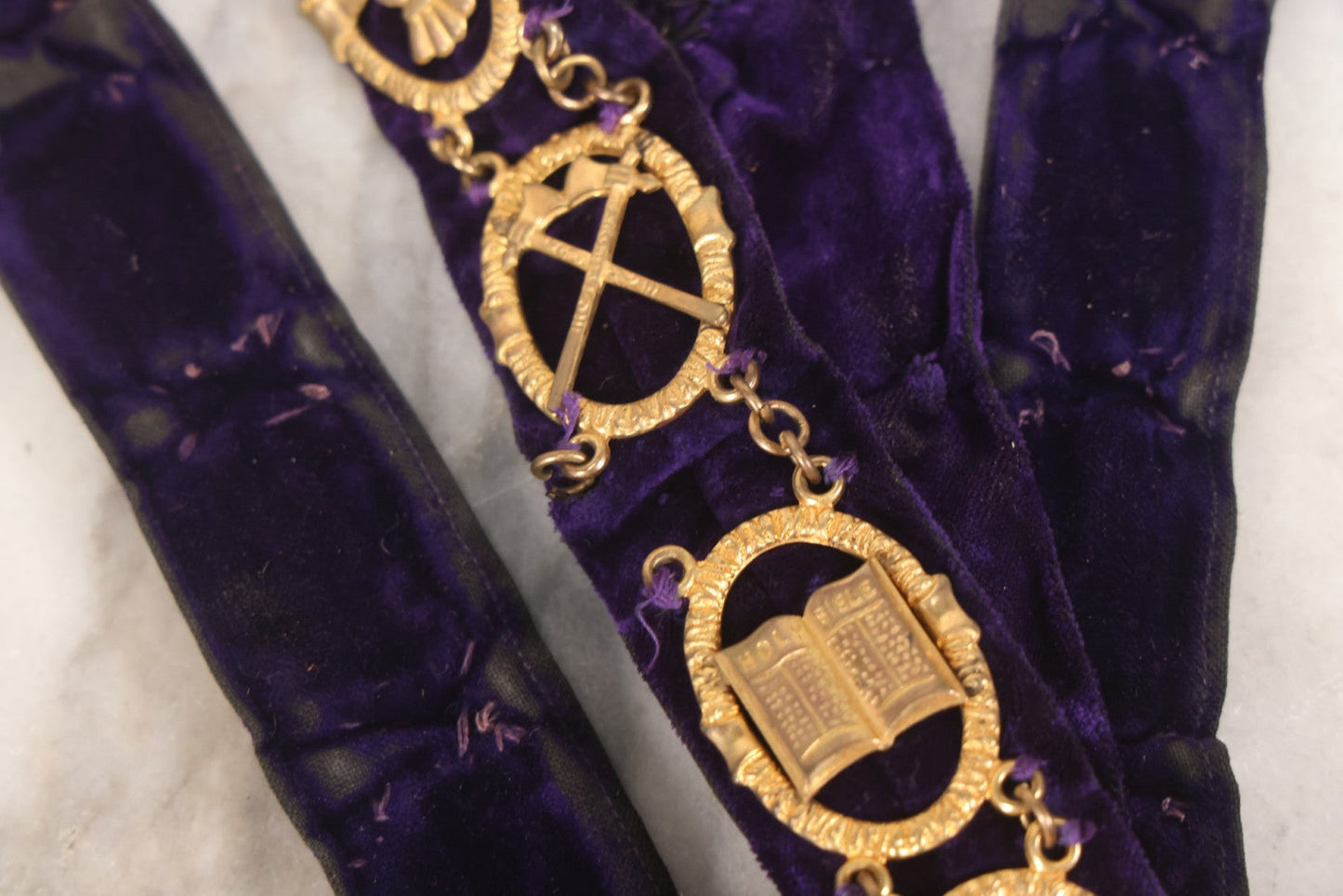 Lot 109 - Grouping Of Four Antique Odd Fellows I.O.O.F.. Purple Chain Collars By Harding Uniform & Regalia Co., Boston, And Fuller Regalia & Costume, Worcester, Massachusetts, With Symbolic Medallions
