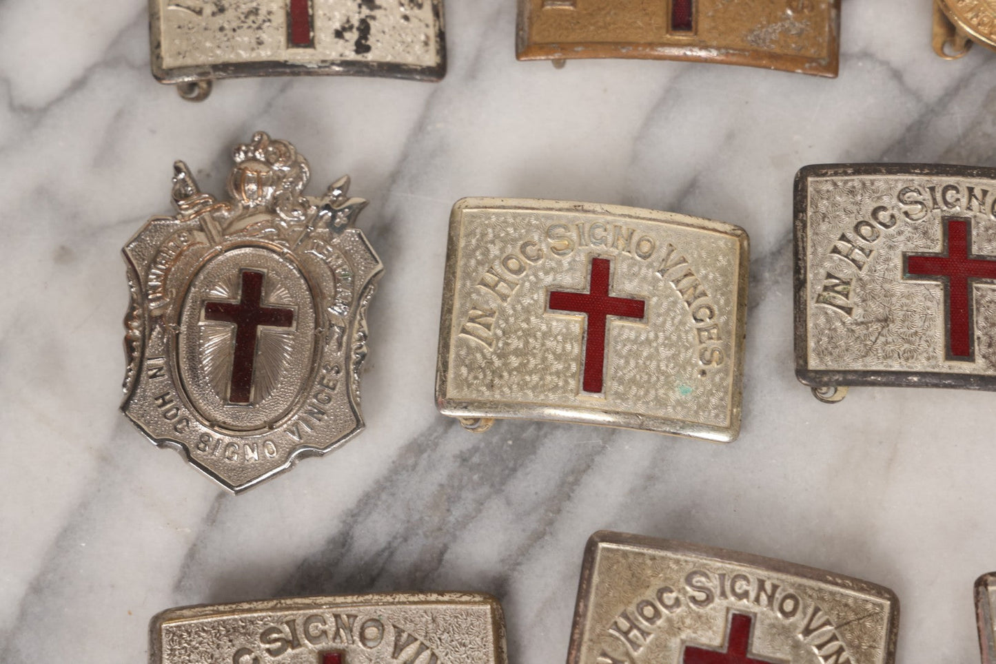 Lot 110 - Grouping Of 22 Vintage And Antique Knights Templar Masonic Belt Buckles With Red Cross And Motto "In Hoc Signo Vinces" ("In This Sign You Shall Conquer")