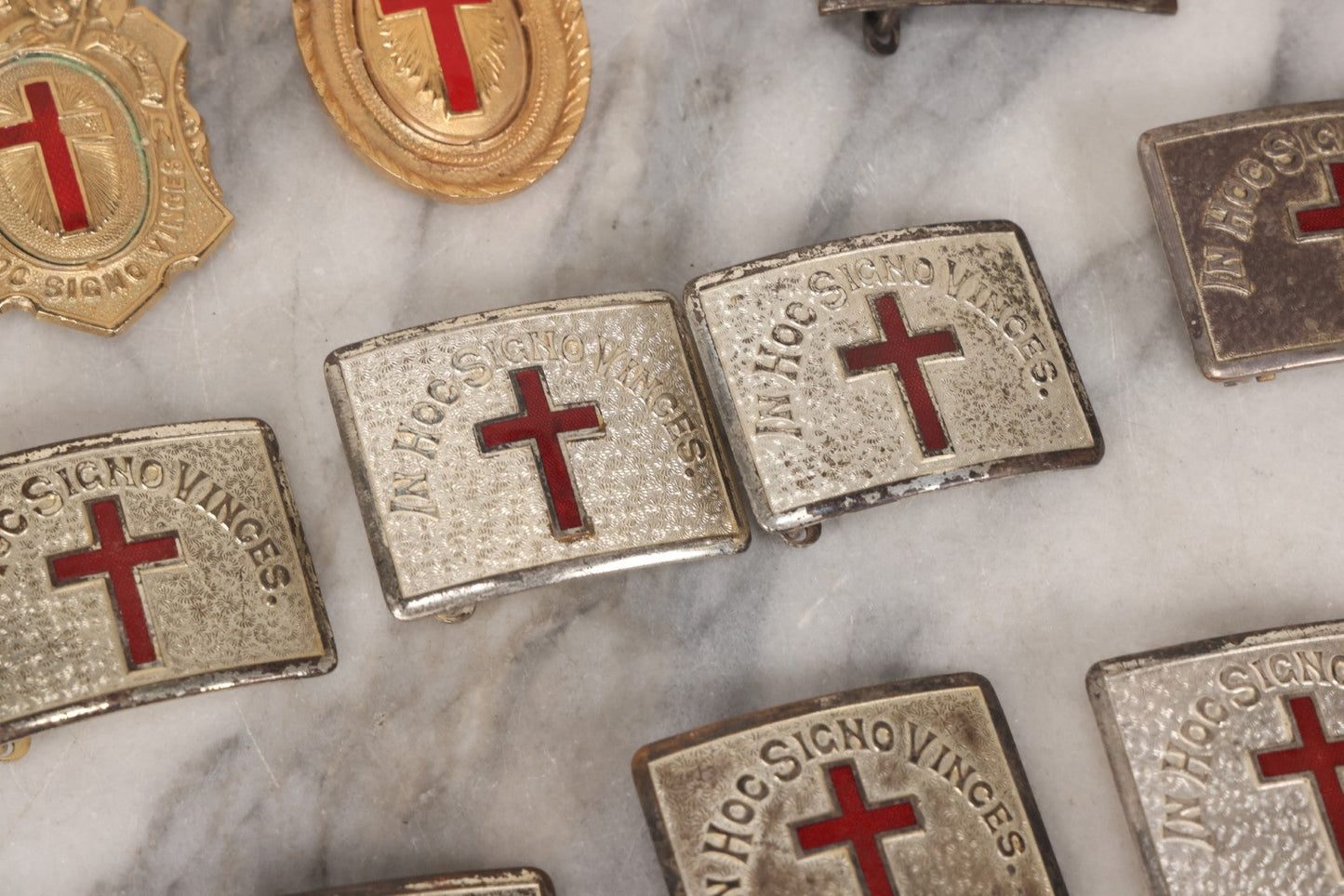 Lot 110 - Grouping Of 22 Vintage And Antique Knights Templar Masonic Belt Buckles With Red Cross And Motto "In Hoc Signo Vinces" ("In This Sign You Shall Conquer")