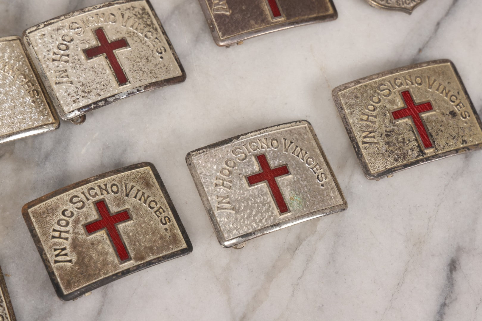 Lot 110 - Grouping Of 22 Vintage And Antique Knights Templar Masonic Belt Buckles With Red Cross And Motto "In Hoc Signo Vinces" ("In This Sign You Shall Conquer")