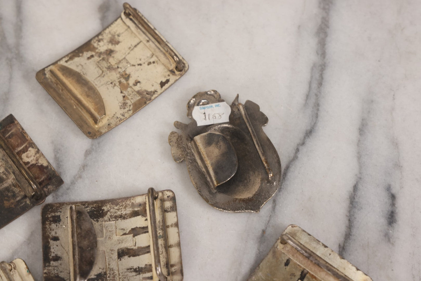 Lot 110 - Grouping Of 22 Vintage And Antique Knights Templar Masonic Belt Buckles With Red Cross And Motto "In Hoc Signo Vinces" ("In This Sign You Shall Conquer")