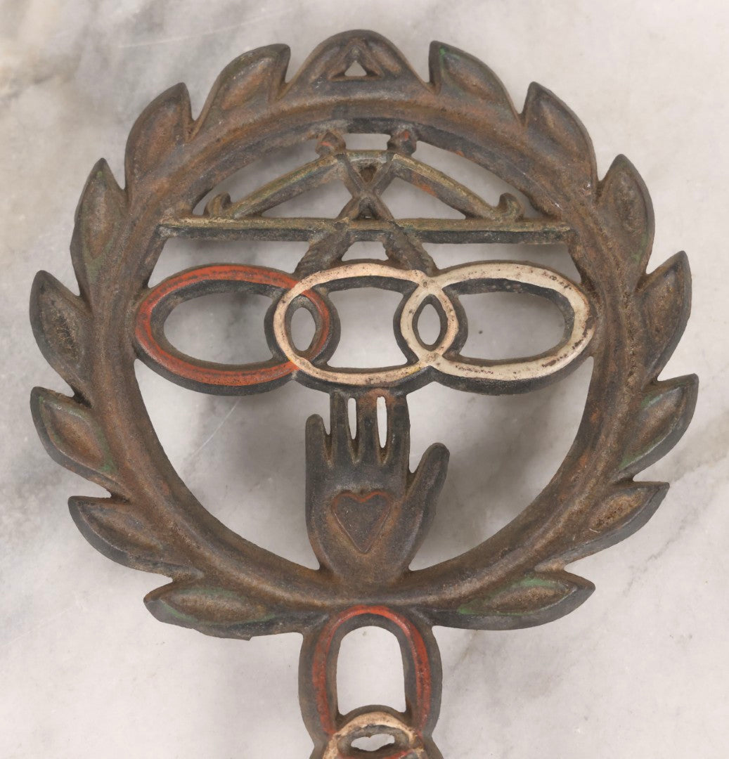 Lot 112 - Vintage Reproduction Cast Iron Odd Fellows I.O.O.F.. Trivet With Three Links, F.L.T., And Heart-In-Hand, Marked Wilton, Circa Mid-20th Century