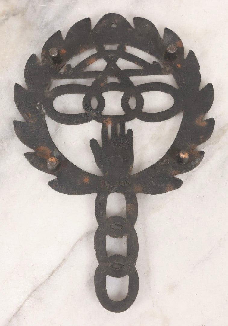 Lot 112 - Vintage Reproduction Cast Iron Odd Fellows I.O.O.F.. Trivet With Three Links, F.L.T., And Heart-In-Hand, Marked Wilton, Circa Mid-20th Century