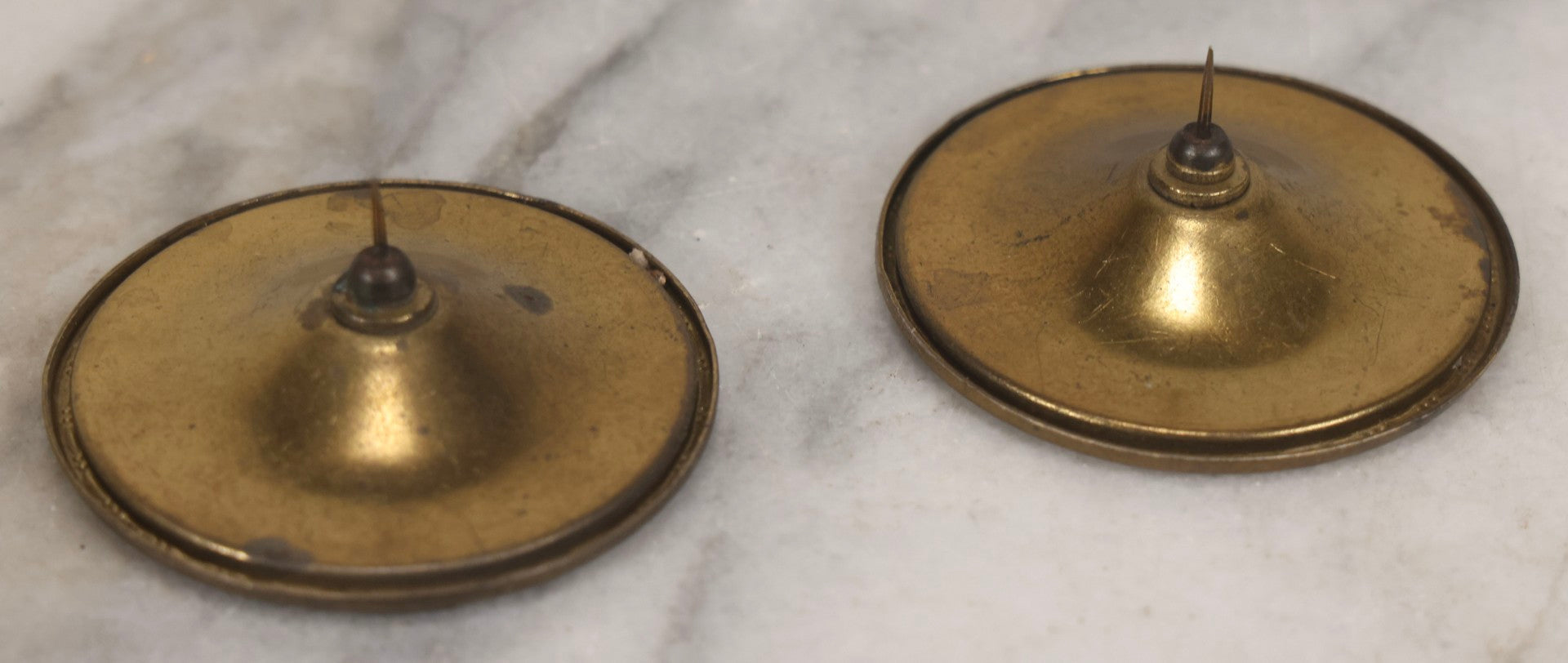 Lot 127 - Pair Of Antique Brass-Mounted Jasperware-Style Hatpins Or Brooches With Dancing Classical Figures, Woman With Cup And Man Playing Flute