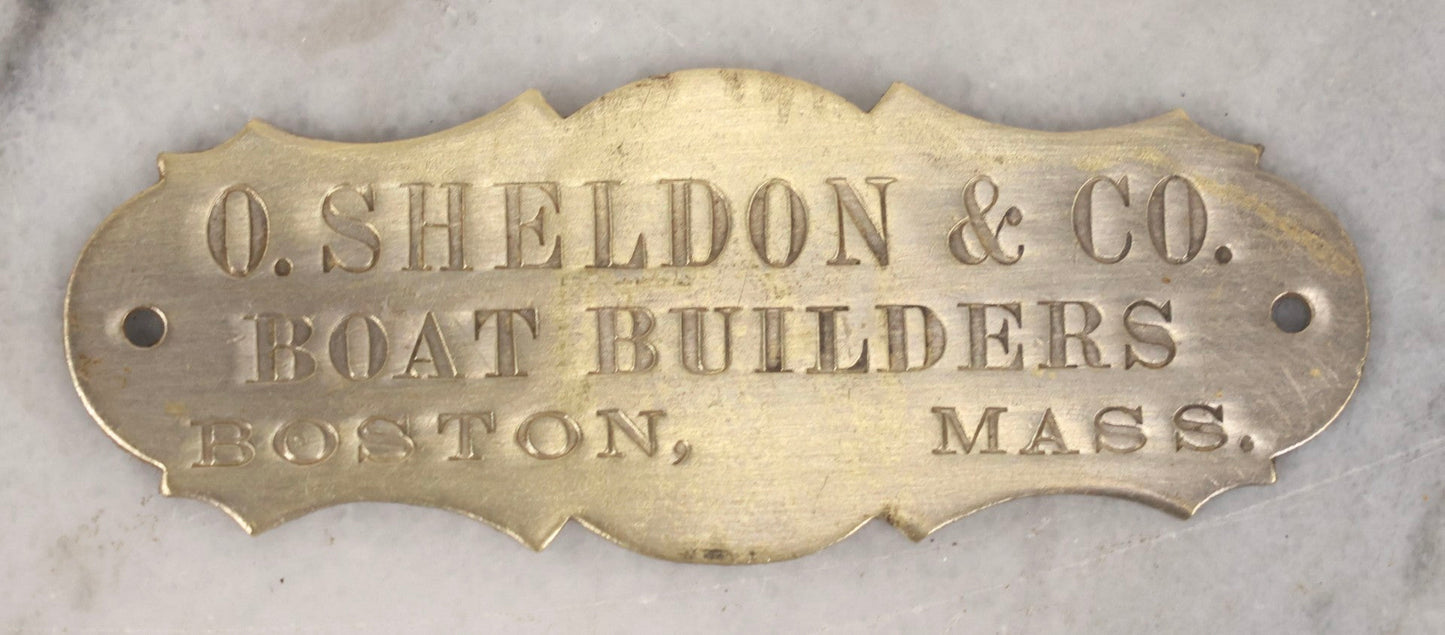 Lot 130 - Antique Brass Nameplate For O. Sheldon & Co. Boat Builders, Boston, Massachusetts, Circa Late 19th Century